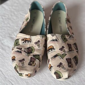 Tom’s Women’s Alpargata Slip On Shoes in Natural “ Camping Adventures “ Motif S7